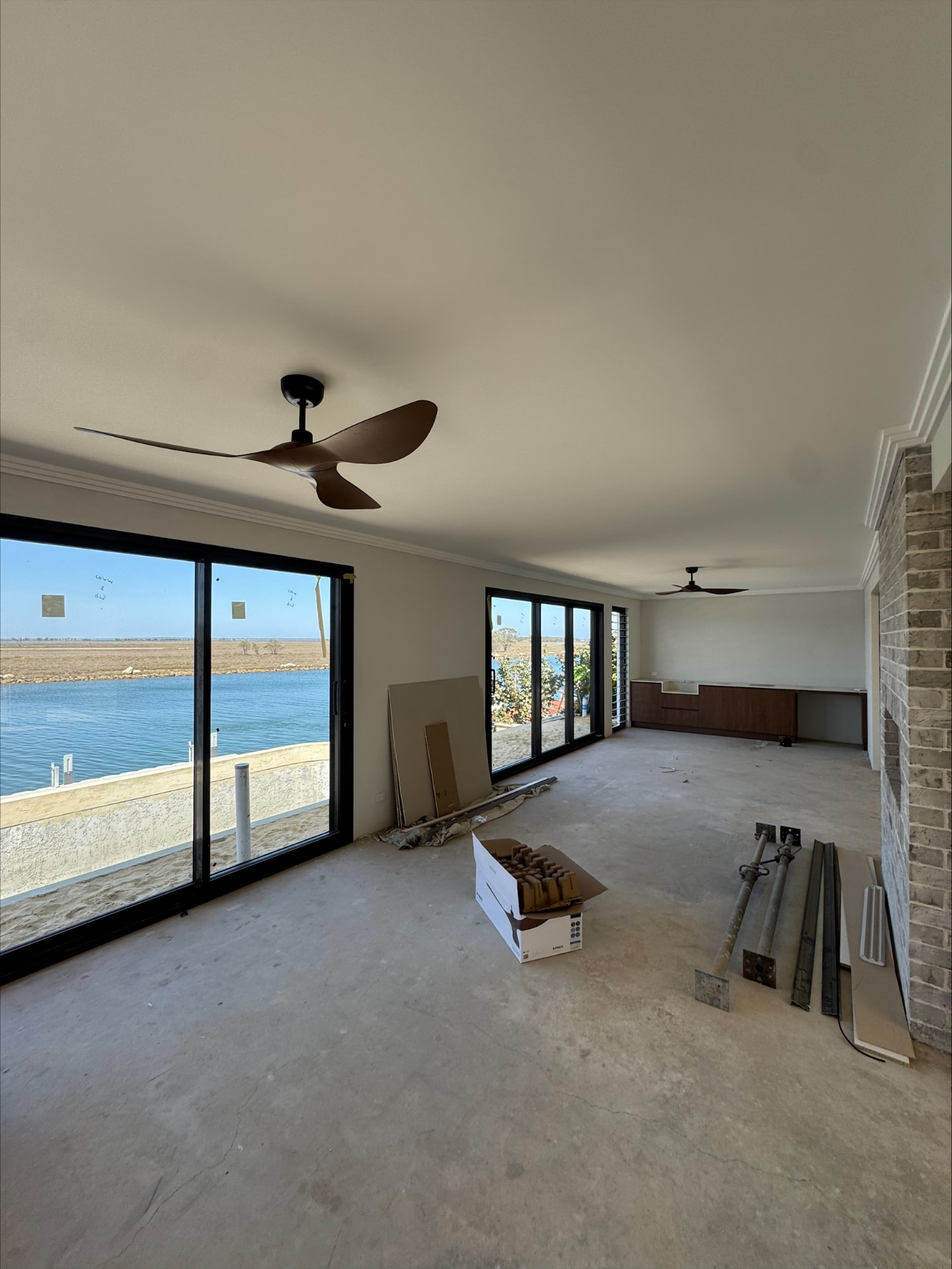 Two modern ceiling fans installed by McGuires Electrical in a Perth home